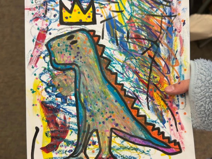 Child's dinosaur painting immitating the art of Jean Michel Basquiat