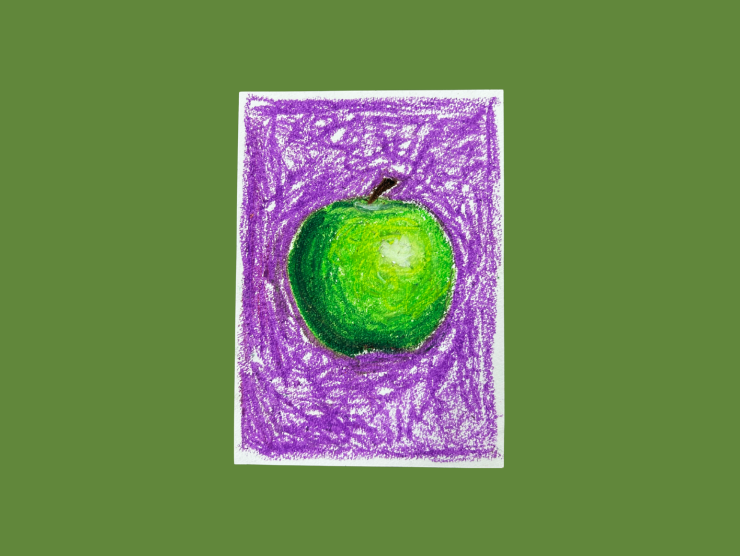 A small oil pastel drawing with a green apple and purple background